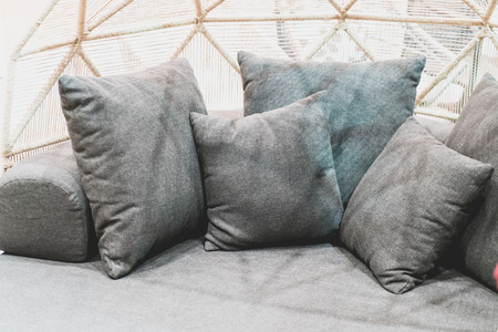 beautiful and comfortable pillow decoration on sofa - vintage effect filter