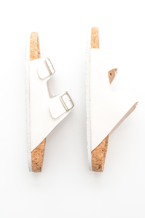 men's and women's (unisex) fashion leather sandals isolated on white backgroundの写真素材