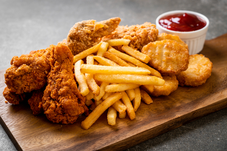 fried chicken with french fries and nuggets meal - junk food and unhealthy foodの写真素材