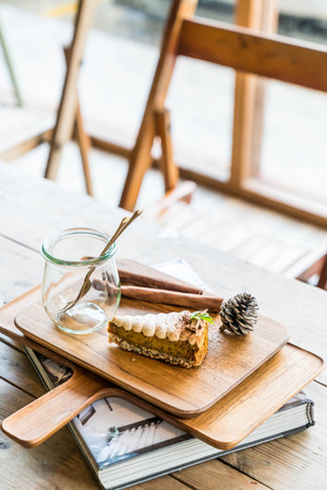 pumpkin pie cake on wood plateの写真素材