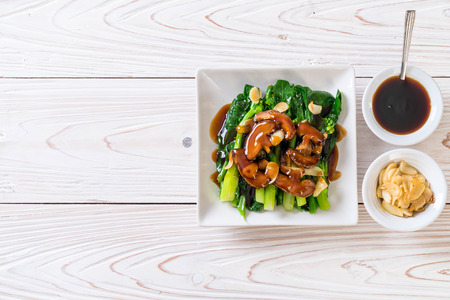 Hong Kong Kale stir fried in oyster sauce with garlicの写真素材