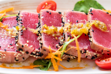 fresh tuna raw with spicy salad sauce - healthy foodの写真素材