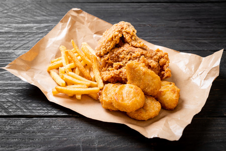 fried chicken with french fries and nuggets meal - junk food and unhealthy foodの写真素材