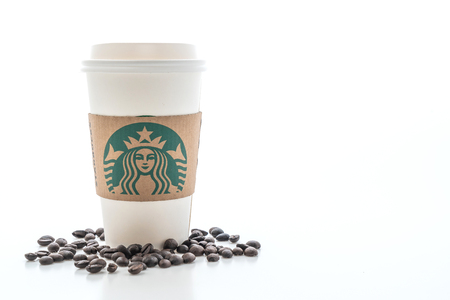 BANGKOK, THAILAND - JUN 5, 2018: White coffee cup with Starbucks logo isolated on white background. Starbucks is the world's largest coffee house with over 20,000 stores in 61 countries.のeditorial素材