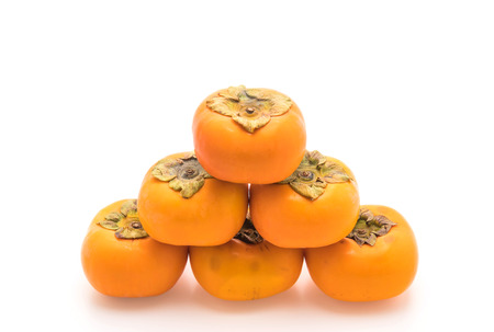 fresh persimmon isolated on white backgroundの写真素材