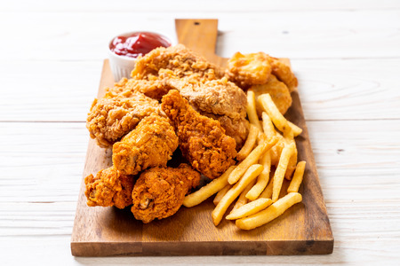 fried chicken with french fries and nuggets meal - junk food and unhealthy foodの写真素材