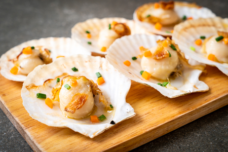 grilled scallops shell with butter and garlicの写真素材