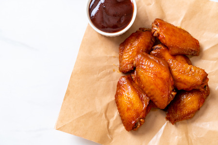 barbecue chicken wings with sauceの写真素材