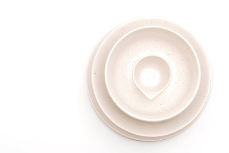 empty plate and bowl isolated on white backgroundの写真素材