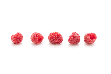 fresh raspberries isolated on white backgroundの写真素材