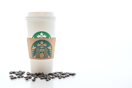 BANGKOK, THAILAND - JUN 5, 2018: White coffee cup with Starbucks logo isolated on white background. Starbucks is the world's largest coffee house with over 20,000 stores in 61 countries.のeditorial素材
