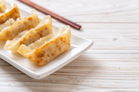 Japanese gyoza or dumplings snack with soy sauceの写真素材