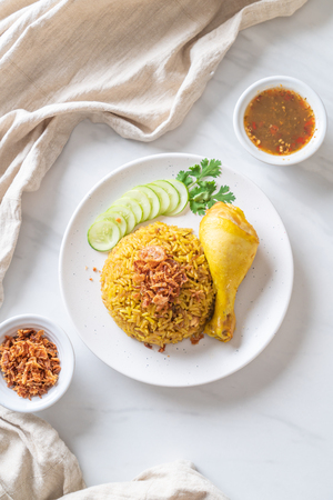 Yellow rice with chickenの写真素材