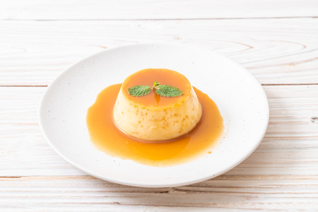 homemade caramel custard pudding with mint