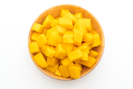 fresh and golden mangoes isolated on white backgroundの写真素材