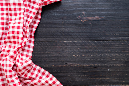 kitchen cloth (napkin) on wood background with copy spaceの写真素材