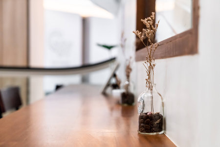 Dried Caspia Flower in vase decoration on wood barの写真素材