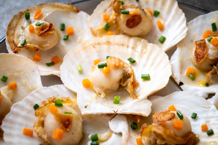 grilled scallops shell with butter and garlicの写真素材