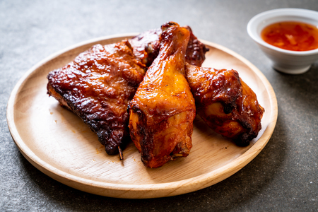 grilled and barbecue chicken on tableの写真素材