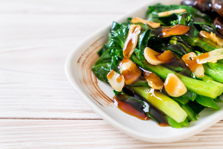Hong Kong Kale stir fried in oyster sauce with garlicの写真素材