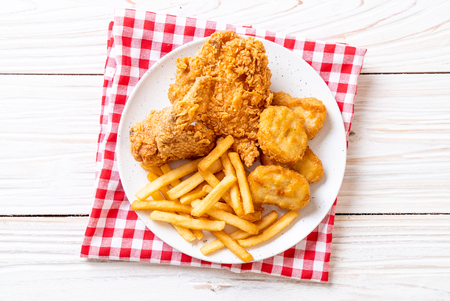 fried chicken with french fries and nuggets meal - junk food and unhealthy foodの写真素材