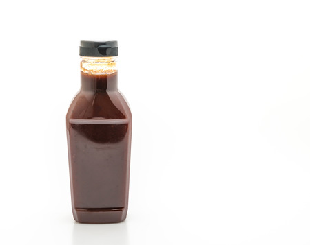 barbecue sauce bottle isolated on white backgroundの写真素材