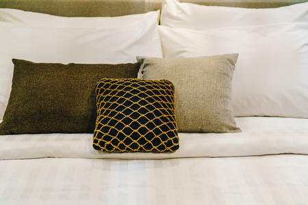 beautiful and comfortable pillow decoration on bed - vintage effect filterの写真素材