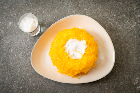 Sweet Egg-Serpentine Cake or Gold Egg Yolk Thread Cakes - Thai dessertの写真素材