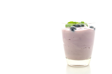 yogurt with fresh blueberries isolated on white backgroundの写真素材