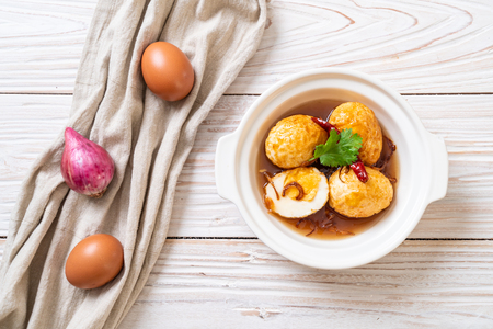 Fried Boiled Egg with Tamarind Sauce or Sweet and Sour Eggsの写真素材