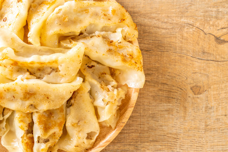 Japanese gyoza or dumplings snack with soy sauceの写真素材