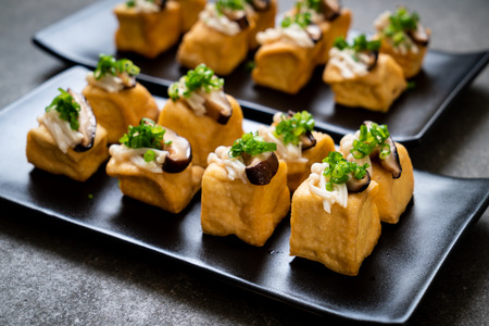 Grilled Tofu with Shitake Mushroom and Golden Needle Mushroom - healthy, vegan or vegetarian food styleの写真素材