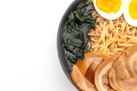 Shoyu ramen noodle with pork and egg isolated on white backgroundの写真素材