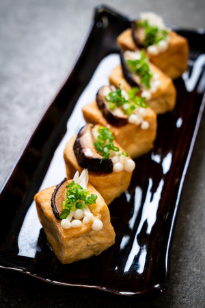 Grilled Tofu with Shitake Mushroom and Golden Needle Mushroom - healthy, vegan or vegetarian food styleの写真素材