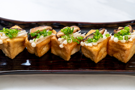 Grilled Tofu with Shitake Mushroom and Golden Needle Mushroom - healthy, vegan or vegetarian food styleの写真素材