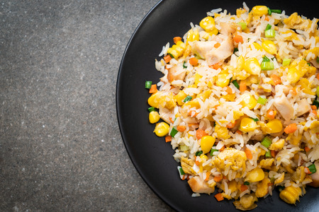 homemade fried rice with chickenの写真素材