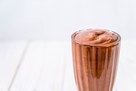 chocolate smoothies milkshake on wood backgroundの写真素材