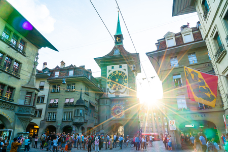 Bern, Switzerland - 23 AUG 2018: People on the shopping alley with the Zytglogge astronomical clock...