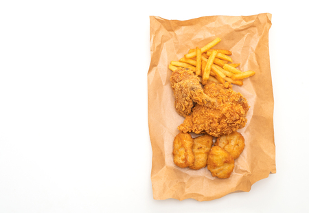 fried chicken with french fries and nuggets meal (junk food and unhealthy food) isolated on white backgroundの写真素材