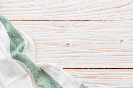 kitchen cloth (napkin) on wood backgroundの写真素材