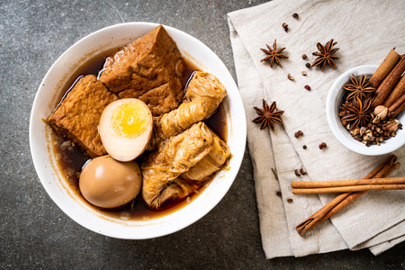 hard-boiled egg in brown sauce or sweet gravy - Asian food
