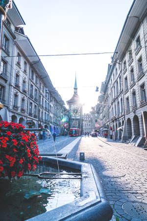 Bern, Switzerland - 23 AUG 2018: People on the shopping alley with the Zytglogge astronomical clock tower of Bern in Switzerland.のeditorial素材