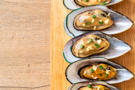 seafood mussels with lemon and garlicの写真素材