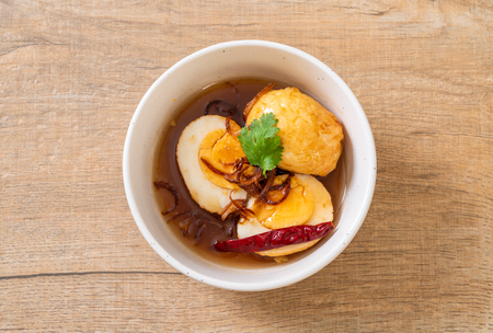 Fried Boiled Egg with Tamarind Sauce or Sweet and Sour Eggsの写真素材