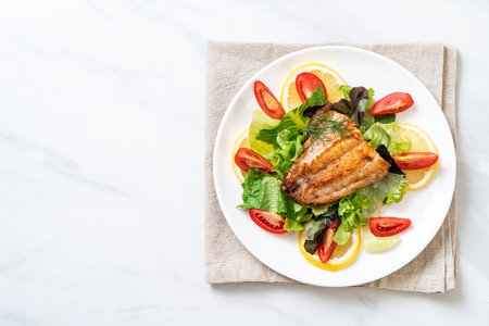 grilled snapper fish steak with vagetableの写真素材