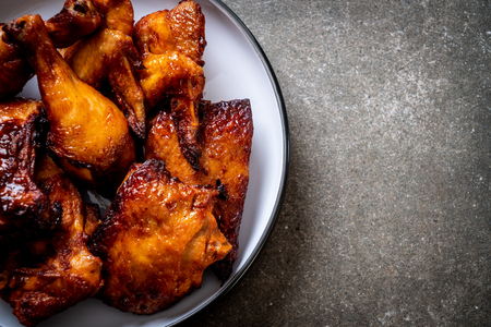 Grilled and barbecue chicken on tableの写真素材