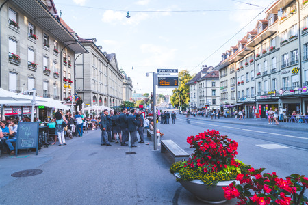 Bern, Switzerland - 23 AUG 2018: People on the shopping alley with the Zytglogge astronomical clock tower of Bern in Switzerland.のeditorial素材