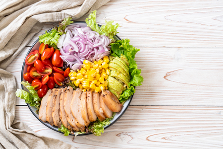 Healthy salad bowl with chicken breast - healthy food styleの写真素材