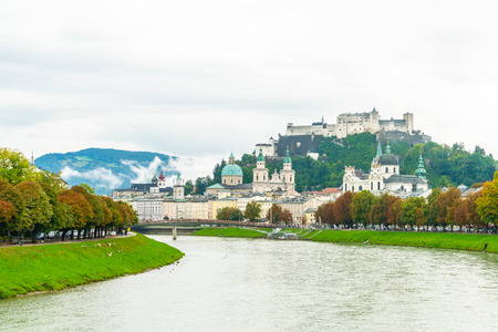 Salzburg City with Festung Hohensalzburg and Salzach river in Austriaのeditorial素材