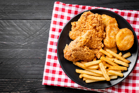 fried chicken with french fries and nuggets meal - junk food and unhealthy foodの写真素材